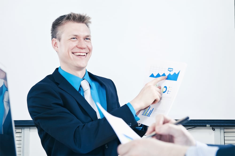 sales person reading a megalytic report