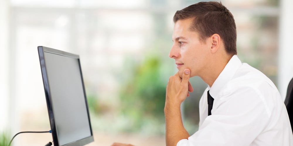 Business Owner Reading Google Analytics Report